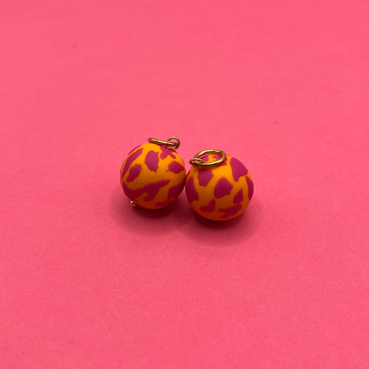 Orange marbles + fuchsia spots